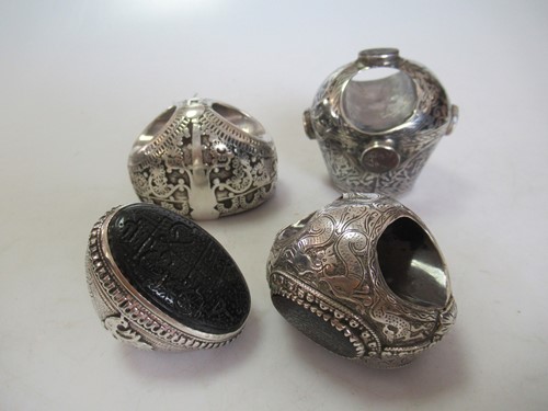 Lot 214 - Four 19th century Arabic silver rings
