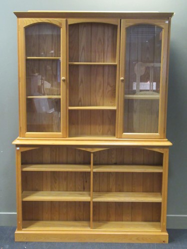 Lot 393 - A modern pine dresser with adjustable shelves...