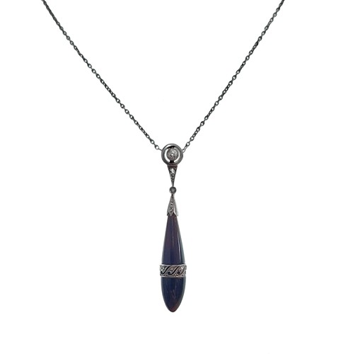Lot 86 - An Art Deco Onyx and diamond pendant and chain