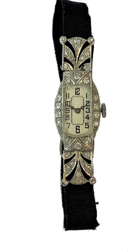 Lot 258 - Unsigned - A platinum diamond set cocktail watch