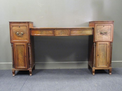 Lot 597 - A late Regency mahogany drop-centre pedestal...