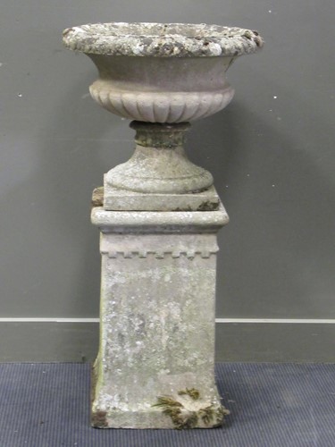 Lot 628 - A garden urn on stand, 110cm high