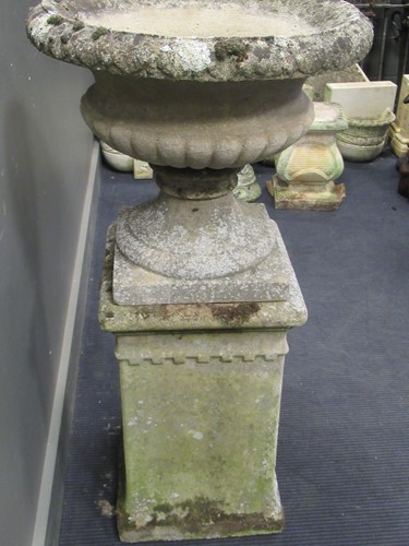 Lot 628 - A garden urn on stand, 110cm high