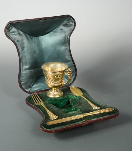 Lot 430 - A Victorian silver gilt four-piece christening set