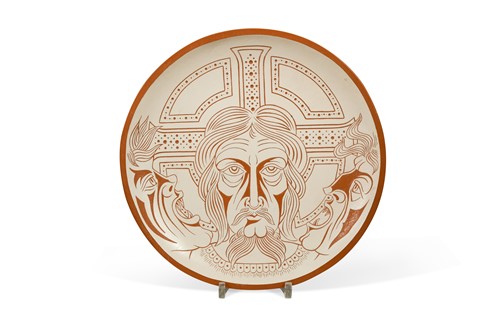 Lot 70 - A terracotta and white slip sgraffito dish