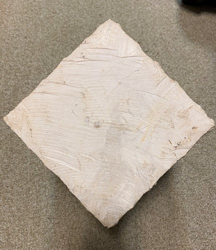 Lot 119 - A carved and polished marble brutalist sculpture