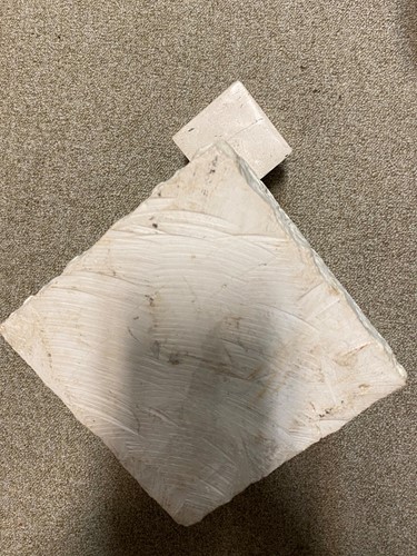 Lot 119 - A carved and polished marble brutalist sculpture