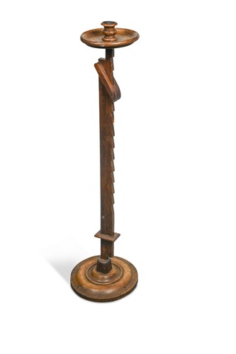 Lot 212 - An Arts & Crafts adjustable fruitwood candle holder