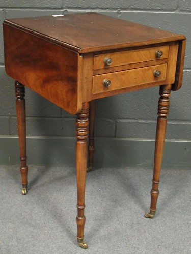 Lot 605 - A Regency mahogany work table comprising of...