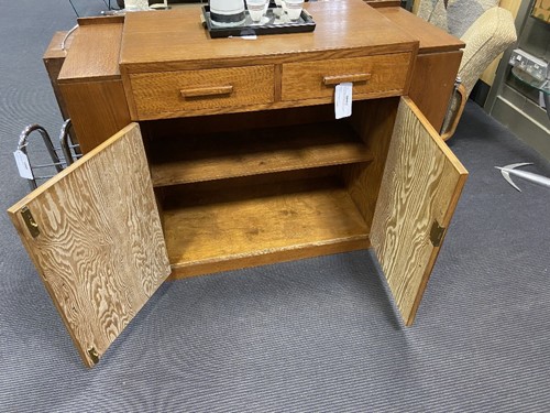Lot 230 - A Heal's golden oak sideboard, circa 1930s