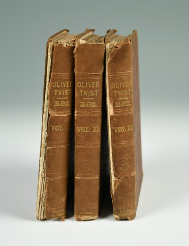 Lot 300 - DICKENS (Charles) Oliver Twist, first edition...