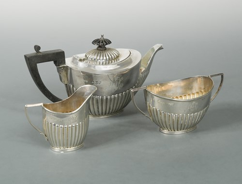 Lot 491 - Chester - A Victorian silver bachelor's three-piece tea set