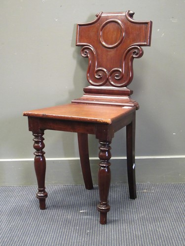 Lot 374 - A William IV carved mahogany and inlaid hall...