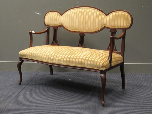 Lot 367 - An Edwardian Arts & Crafts mahogany settee, of...