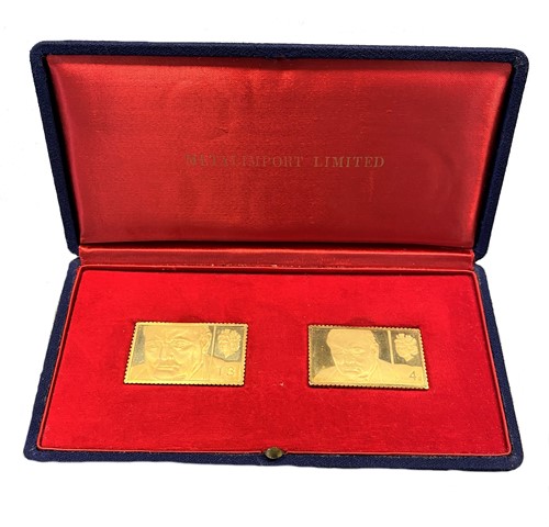 Lot 319 - A cased pair of 18ct gold replica postage stamps