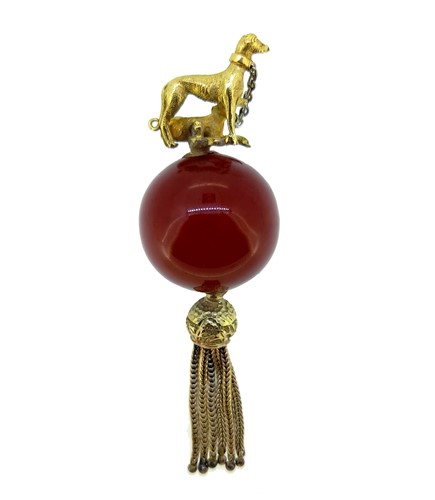 Lot 29 - A greyhound and cornelian pendant