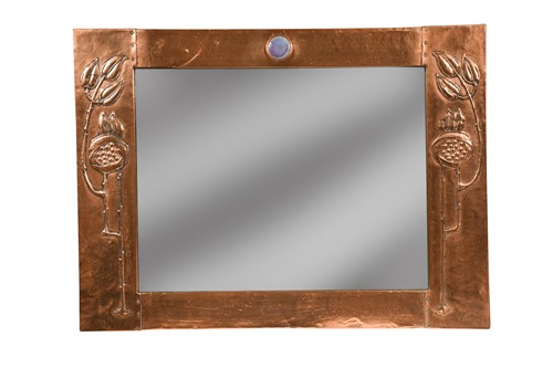 Lot 217 - A Glasgow School copper framed wall mirror, circa 1900