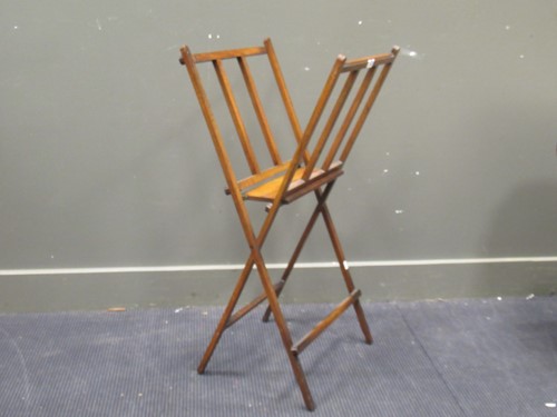 Lot 725 - A folding Reves & Son wooden folio stand