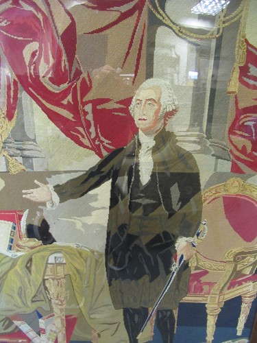 Lot 311 - A 19th Century needlework picture of George...