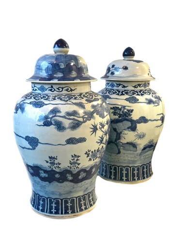 Lot 102 - A pair of large Chinese blue and white decorated vases and covers, 20th century