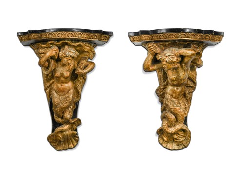 Lot 821 - A pair of carved giltwood and painted wall brackets, early 19th century