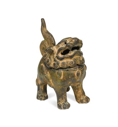 Lot 141 - A Chinese bronze guardian Buddhist lion, circa 1900