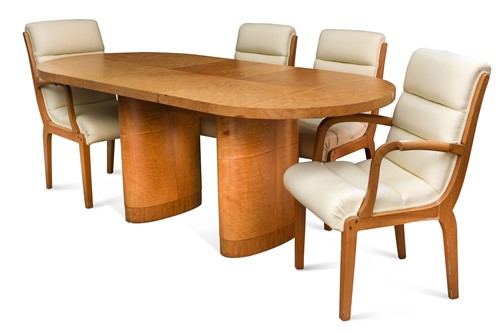 Lot 248 - An Art Deco sycamore extending dining table and six chairs