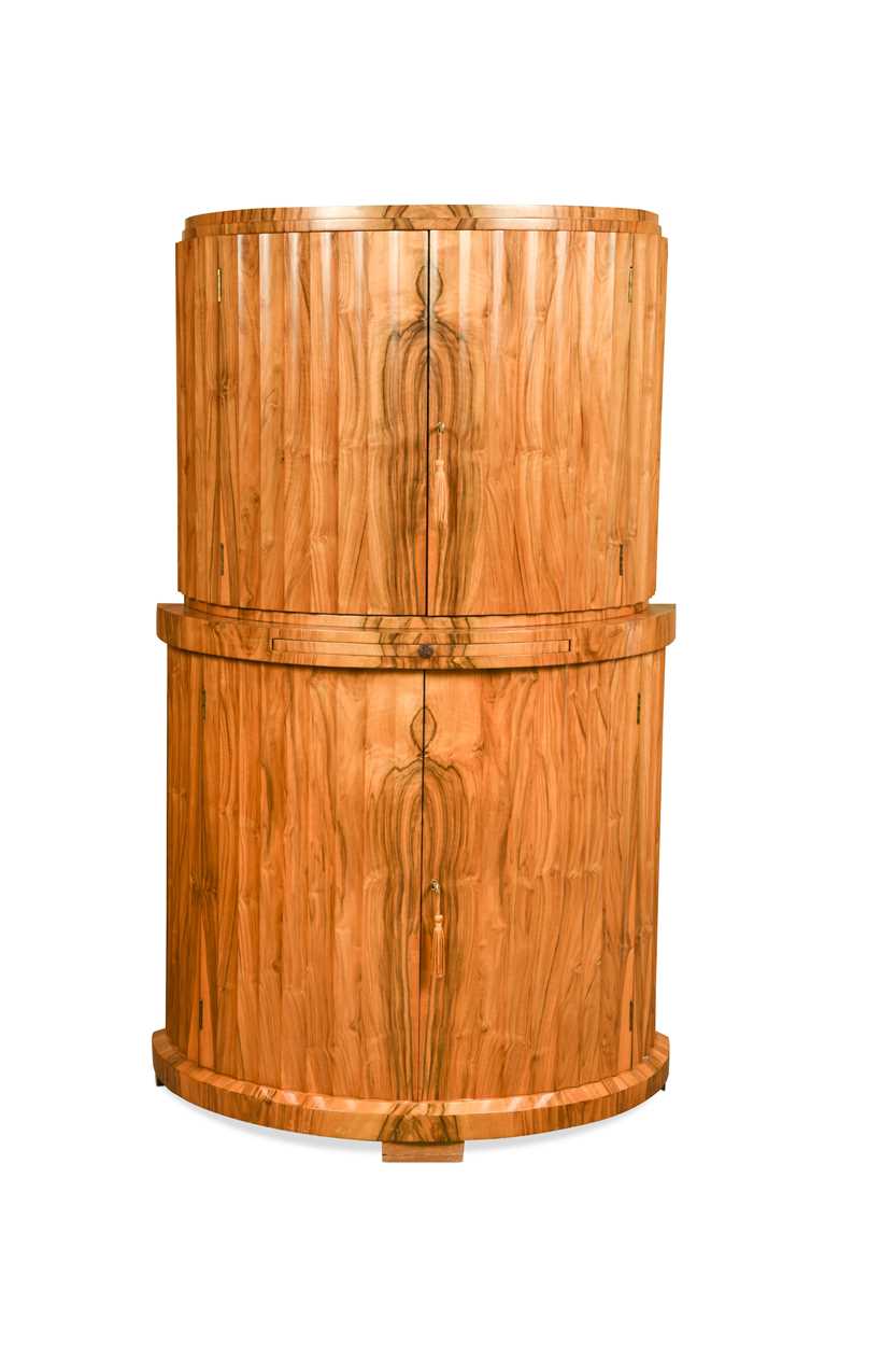 Lot 251 - Attributed to Harry & Lou Epstein, an Art Deco figured walnut demi-lune cocktail cabinet, circa 1930
