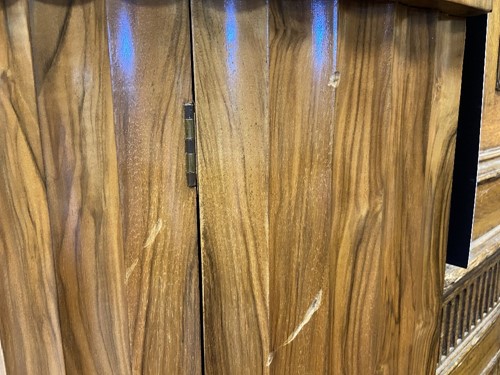 Lot 251 - Attributed to Harry & Lou Epstein, an Art Deco figured walnut demi-lune cocktail cabinet, circa 1930