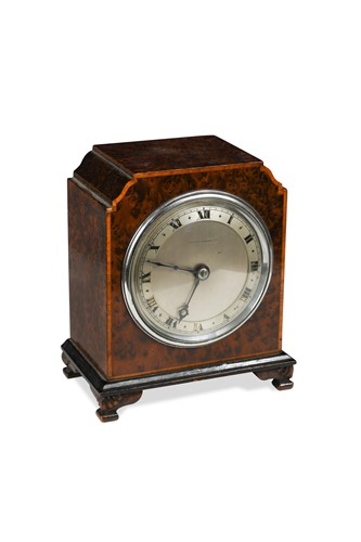 Lot 171 - An early 20th century bur walnut cased table clock by Mappin & Webb