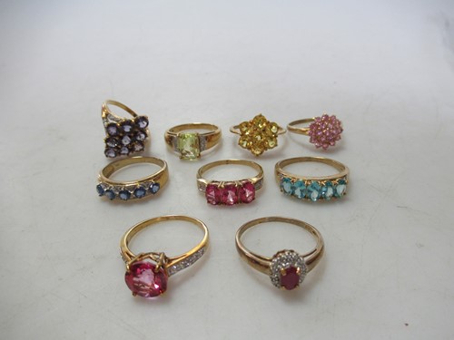 Lot 186 - A 9ct gold ruby and diamond cluster ring,...