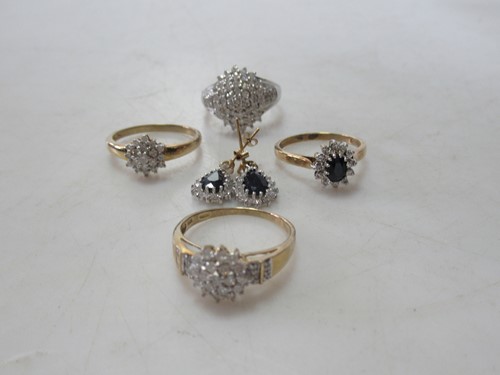 Lot 184 - Three 9ct gold diamond cluster rings, together...