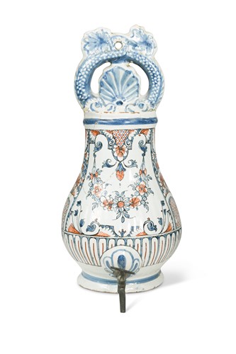 Lot 486 - A continental pottery wall mounted water cistern