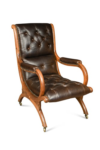 Lot 913 - A Regency oak Spanish chair in the manner of Gillows