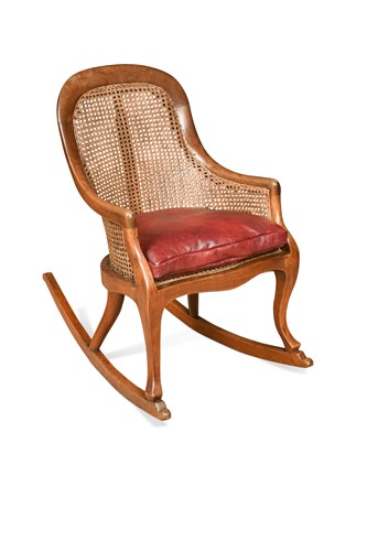 Lot 964 - A beech wood child's rocking chair