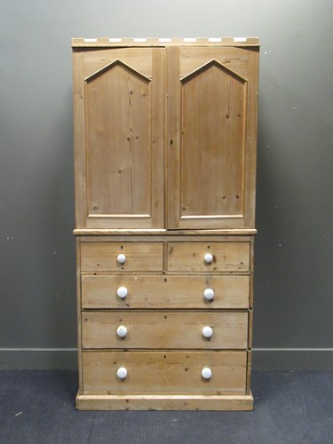 Lot 394 - A Victorian pine linen press with castellated...