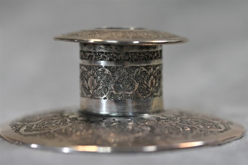 Lot 356 - A 20th century Iranian metalwares vase together with a pair of dwarf candlesticks