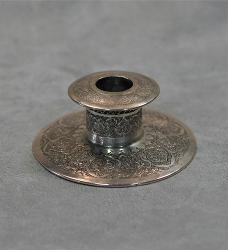 Lot 356 - A 20th century Iranian metalwares vase together with a pair of dwarf candlesticks