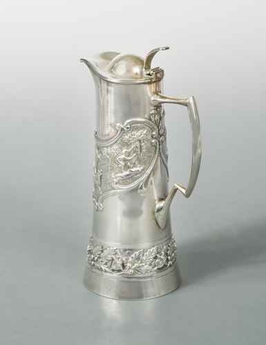 Lot 355 - An Indian metalwares lidded jug
