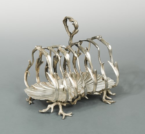Lot 417 - A Victorian silver substantial seven bar toast rack, mark of John Samuel Hunt