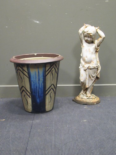 Lot 541 - A cast iron garden statue and a glazed garden pot