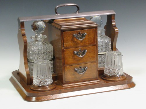 Lot 62 - A Waker & Hall oak and electroplate 'Hold All'...
