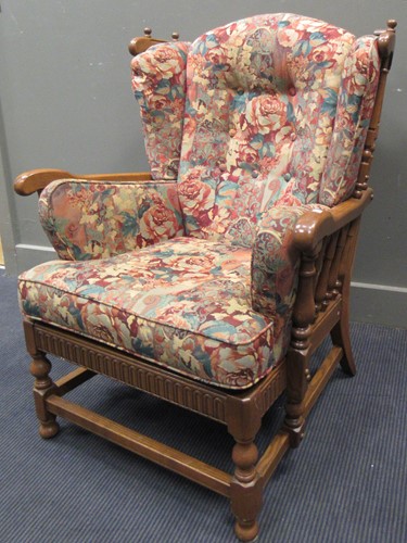 Lot 584 - An Ercol arm chair