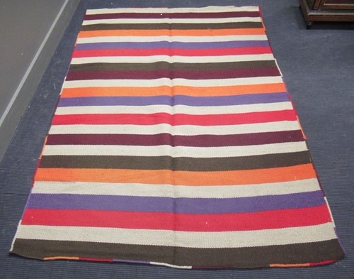 Lot 555 - A 20th century flat weave carpet or wall...