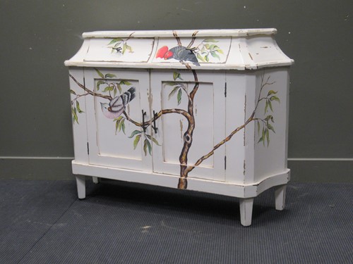 Lot 457 - A modern painted side cabinet decorated with...