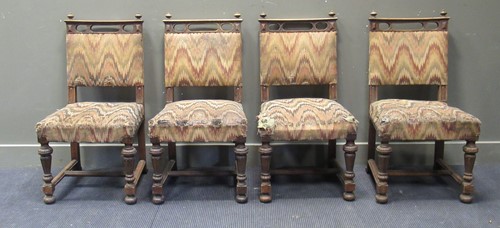 Lot 444 - A set of four Gothic style oak dining chairs....