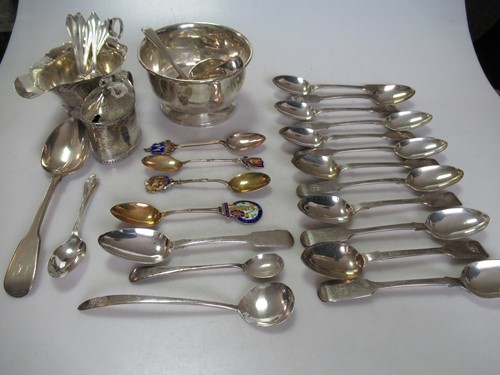 Lot 209 - A collection of silver flatware, together with...