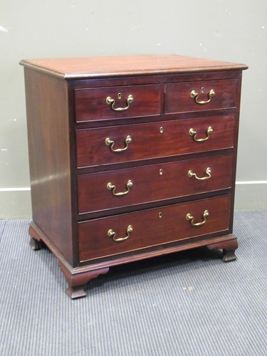 Lot 482 - A Georgian style mahogany chest of two short...