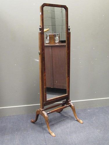 Lot 403 - A 20th century walnut cheval mirror on four...