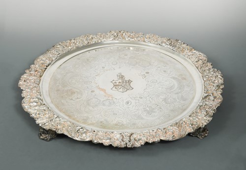 Lot 330 - A large mid 19th century Old Sheffield Plate charger with later decoration